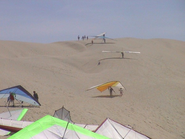 Hang Gliding in Pacific City walking up Cape Kiwanda